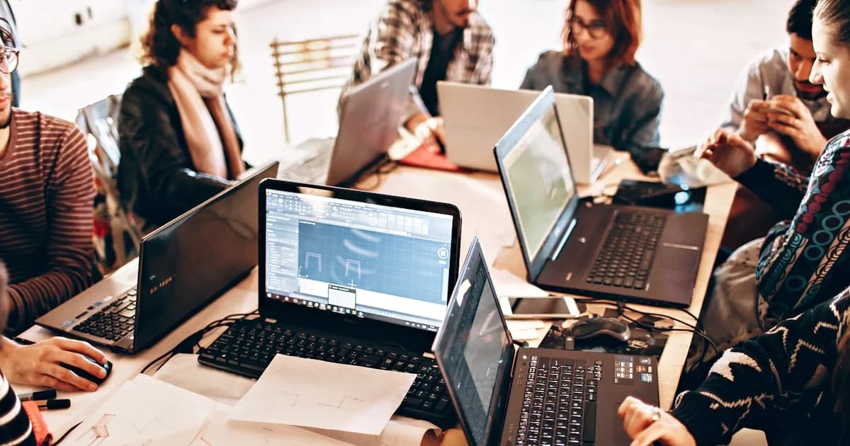 person using black laptop computer
