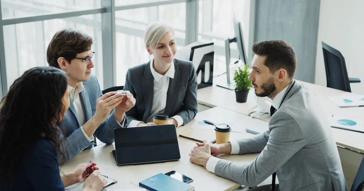 Diverse business team collaborating in a modern office.