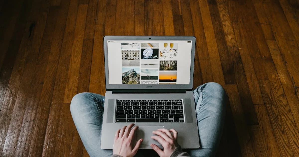 person using laptop on lap