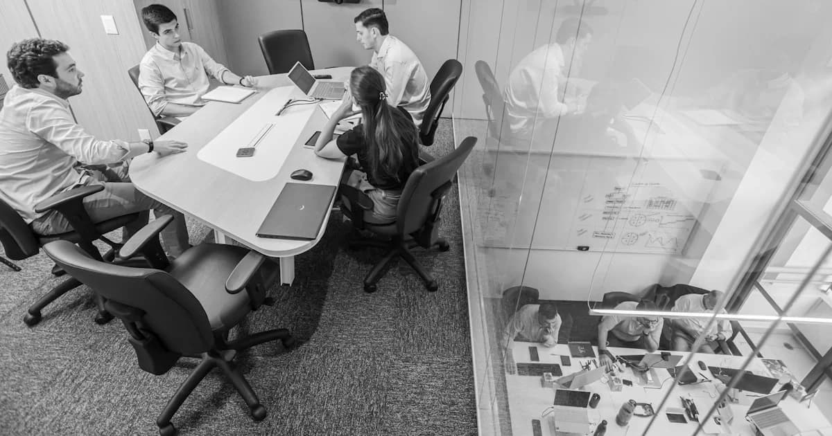 Team meeting in a modern conference room.