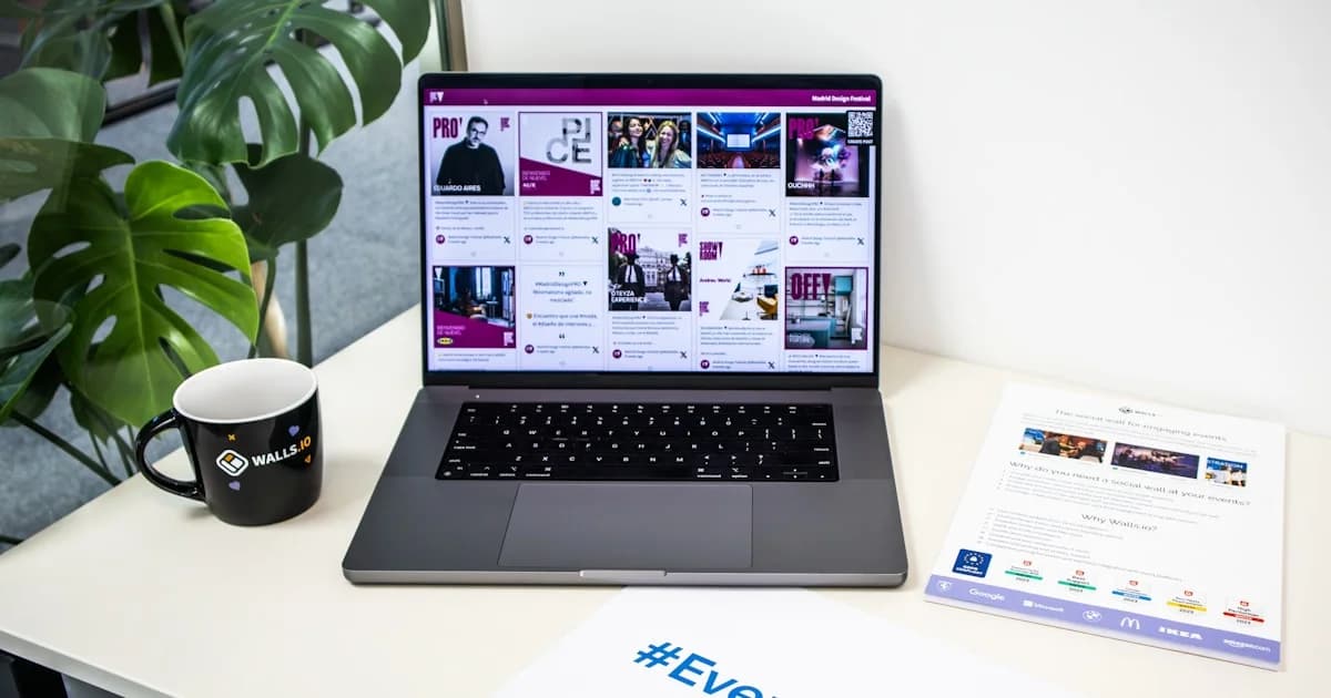 a laptop computer sitting on top of a desk