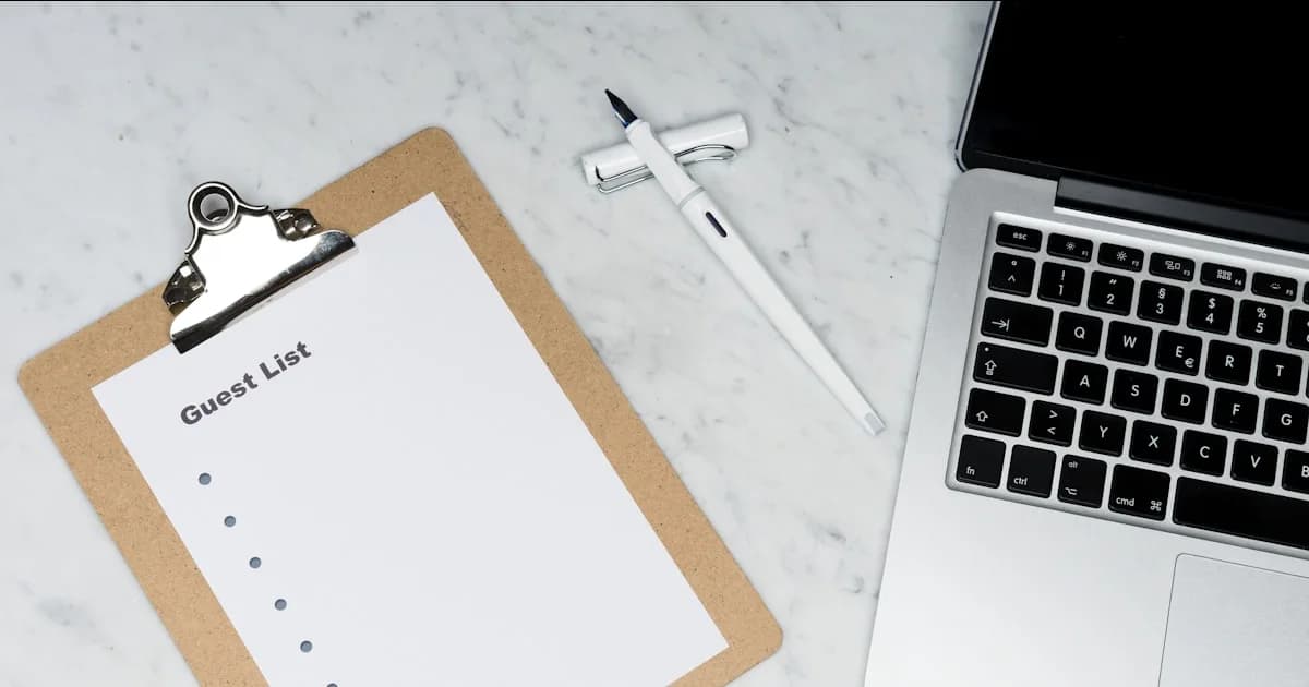 white paper on silver laptop computer