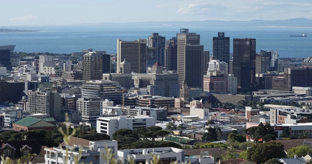 a view of a city with a large body of water in the background
