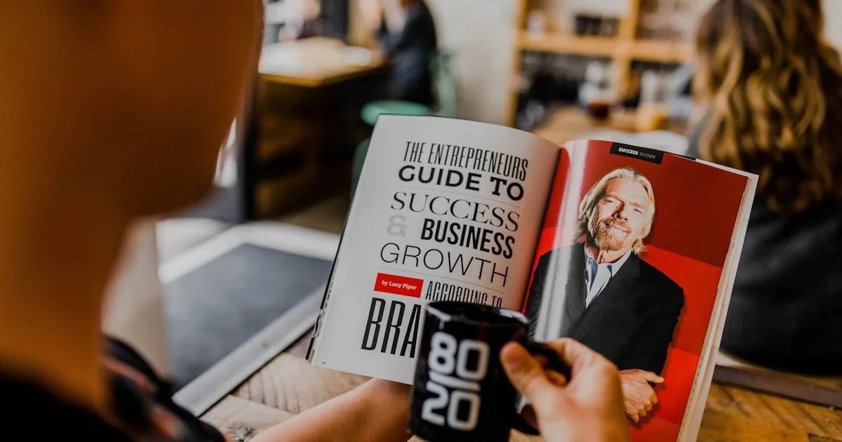 man reading magazine