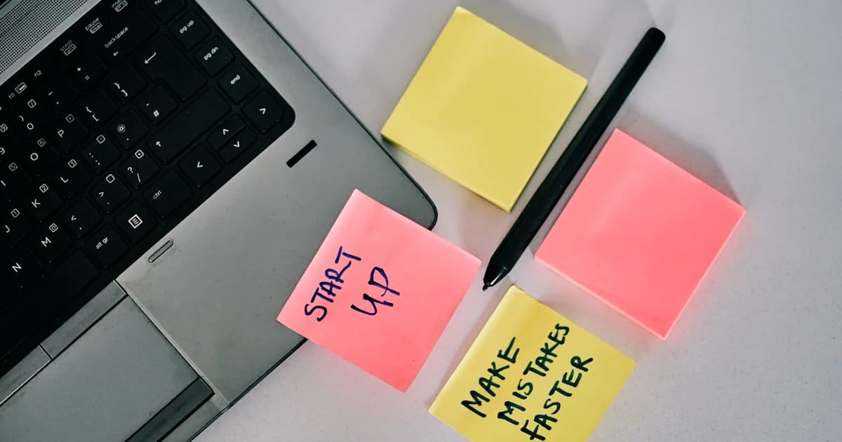 yellow sticky notes on laptop computer