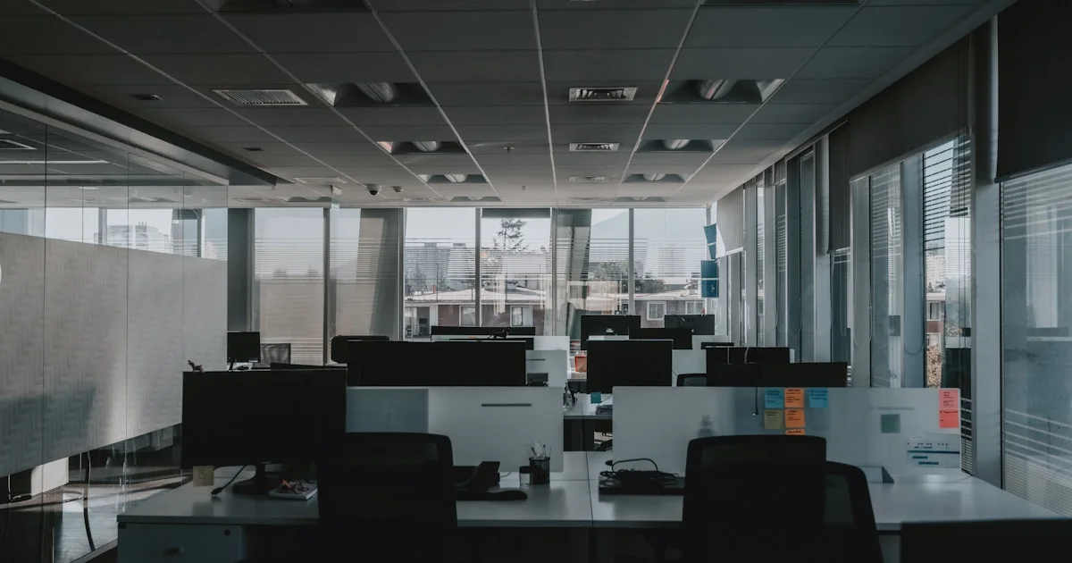 black chairs and table in white room