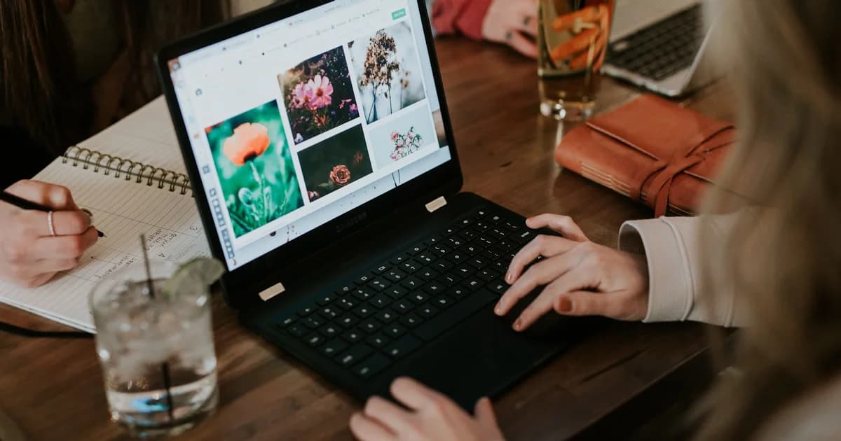 woman using black laptop computer