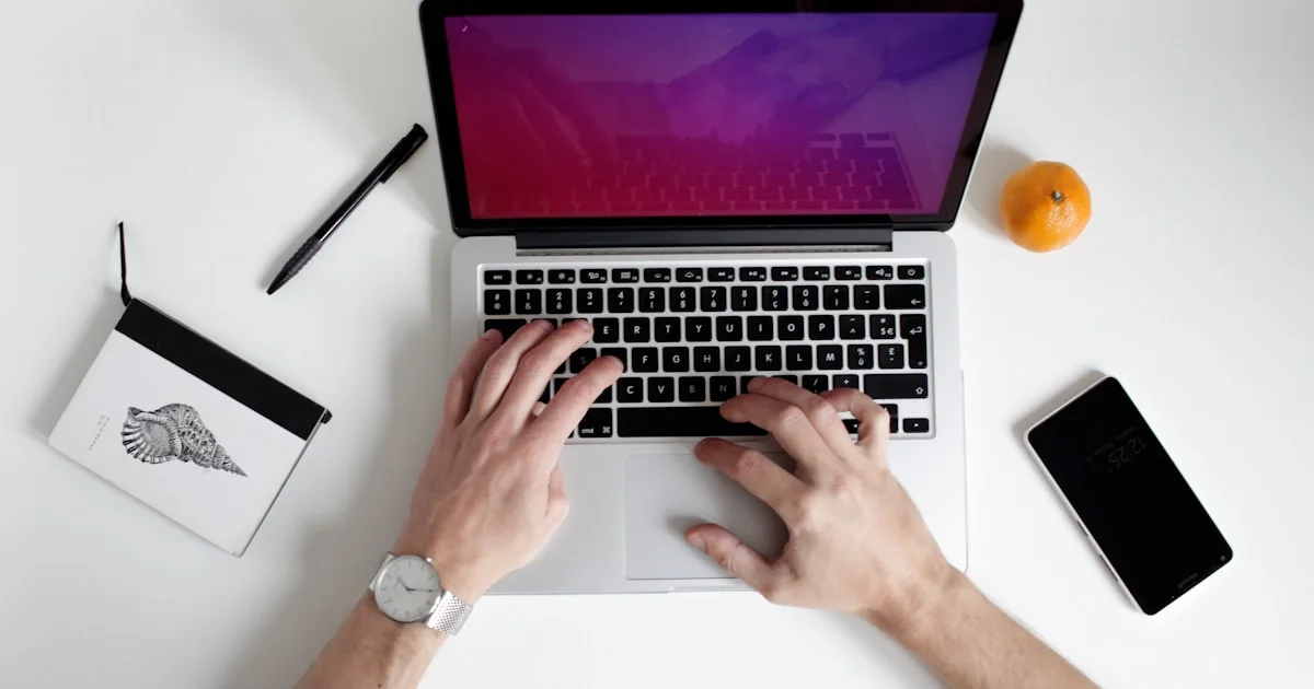 person using laptop computer