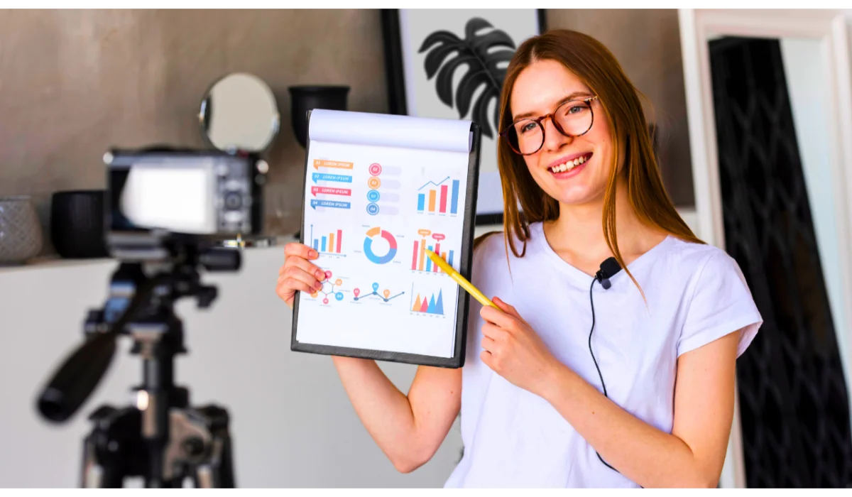 Woman showing graphs on paper